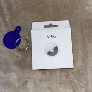 NEW. UNOPENED. Apple AirTag. With silicon cover